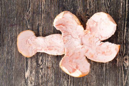 Peeled large grapefruit peel, peel lies on a wooden table