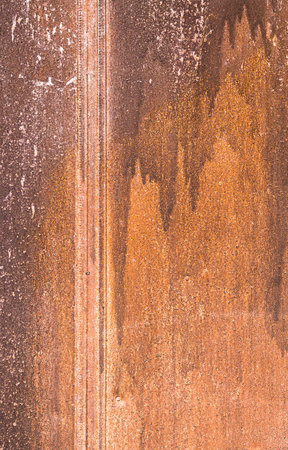 old metal sheet tin covered with traces of rust and corrosion from exposure to water and oxygen,...