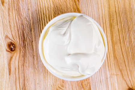 thick white sour cream made from high quality fat milkの写真素材