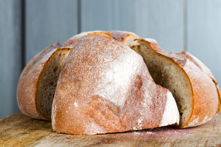 sliced bread round shape of wheat and rye flour, light bread, cut into pieces