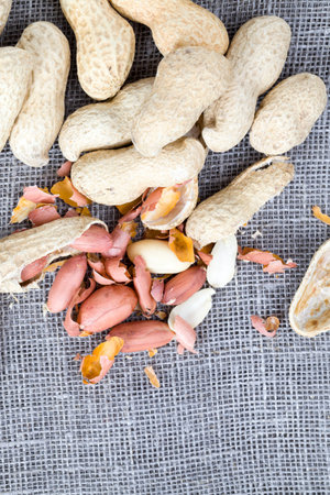 a large number of peeled nuts peanut during cooking, close-up of the plant is used in people's food