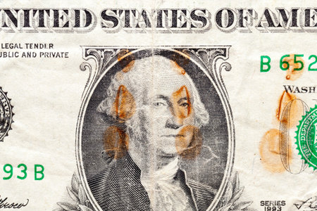 close-up of a detail of American dollars with a portrait of the President, the face value of an old...