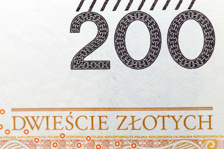 a clean and new bill worth two hundred Polish zlotys, a close-up of cash Polish money on the front side, the obverse of the zlotysの写真素材