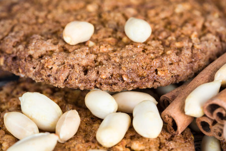 walnut chips and whole peanuts in baked goods made with oat flour, kitchen table