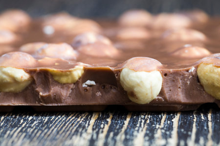 roasted hazelnuts used in chocolate to give it a specific special taste, whole nuts in a chocolate...