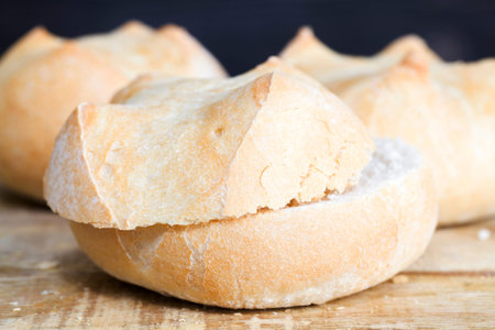 sliced fresh round white buns, close-up of cereal food for making sandwiches