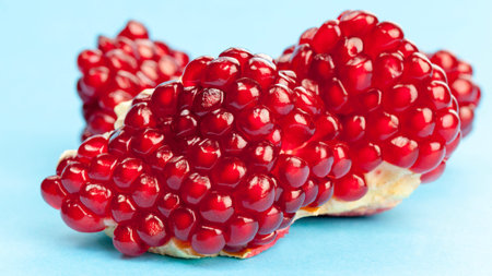 broken and divided red pomegranate, real ripe fruit large pomegranate fruit