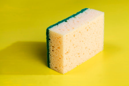 yellow sponge for washing dishes and other items, close-up of kitchen sponges