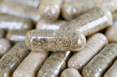 combined with different structures of homeopathic capsules that are used for the treatment of diseases, the concept of medicine for modern colds and flu, and other acute respiratory diseases in folk medicineの写真素材