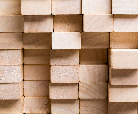 wooden surface made of equal size cubes, made of wood material, bamboo as the material closeupの写真素材