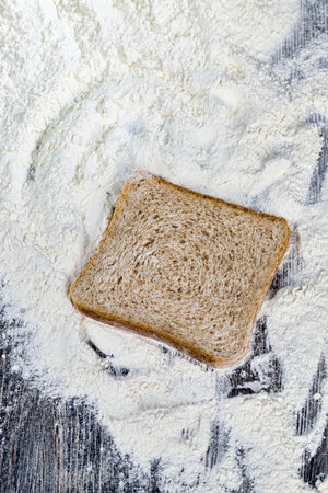 sliced fresh bread in white wheat flour, close-up of food on the table