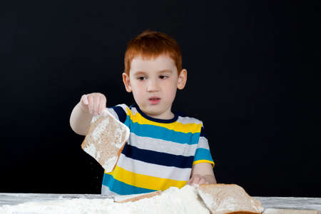 work in the kitchen with wheat flourの写真素材