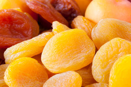 dried ripe apricots, traditional food in a number of Eastern countries, dried apricots are healthy and delicious with a lot of sugar and vitamins, closeupの写真素材