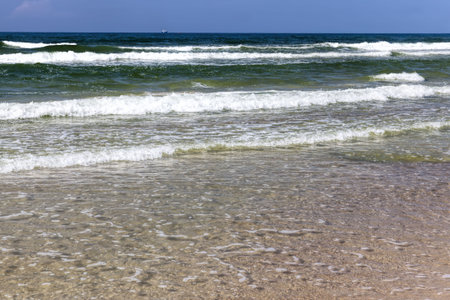 beautiful Baltic sea in August 2019 before the problems with isolation and pandemic, the water is cold despite the summer and August monthsの写真素材