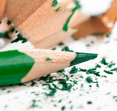 one single color wooden pencils with green pencil drawing and creativity, close-up pencil made of natural eco-friendly materials safe for work and studyの写真素材