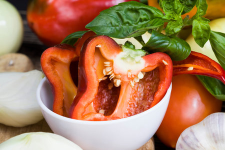 pepper, onion, zucchini, garlic and other vegetables on the kitchen table, cooking and salads from...