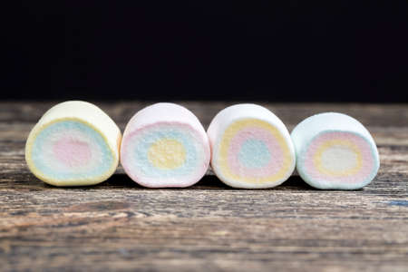colored sweet soft cylindrical marshmallows made from sugar, gelatin, starch and other ingredients, sweet marshmallowsの写真素材