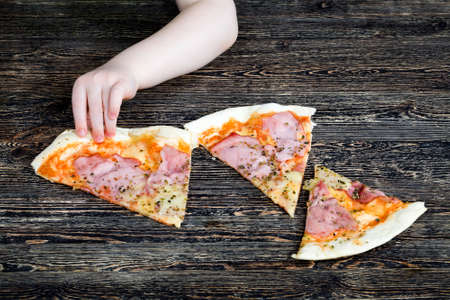 one pizza stuffed with ham, cheeseの写真素材