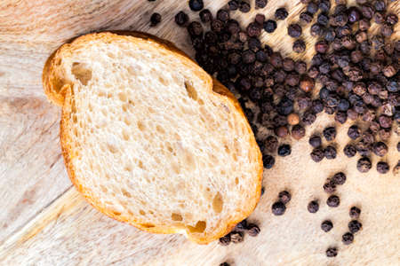 sliced baguette with spicesの写真素材