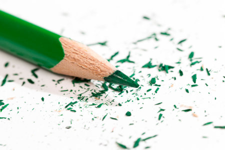 one single color wooden pencils with green pencil drawing and creativity, closeup pencil made of natural eco-friendly materials safe for work and studyの写真素材