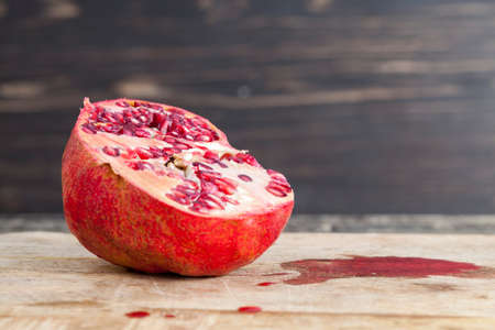ripe pomegranate cutの写真素材