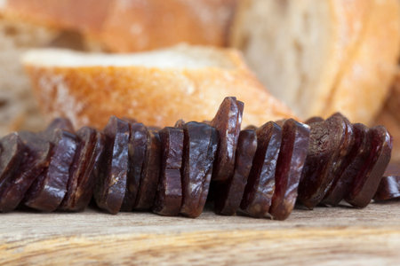 meat cut into thin pieces at home, cooking from semi finished sausages