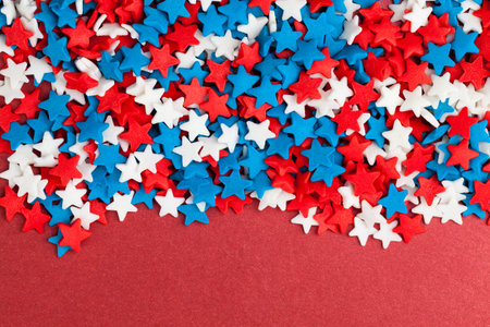 red, blue and white star-shaped candies for decorating cakes and desserts