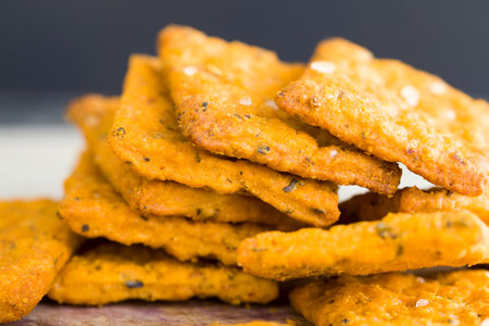 wheat crackers with the addition of dried vegetables and spices, healthy dietary foods rich in...