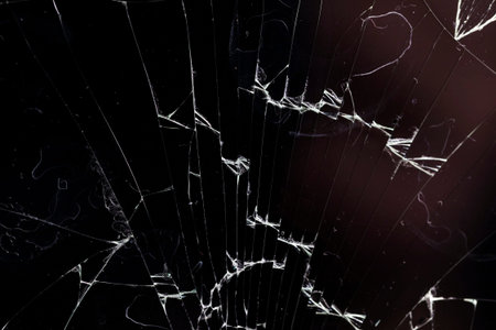old broken glass with cracks and various stains and dirt