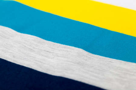 a piece of material made of synthetic material painted different colors, high-quality artificial fabric is a part of clothingの写真素材