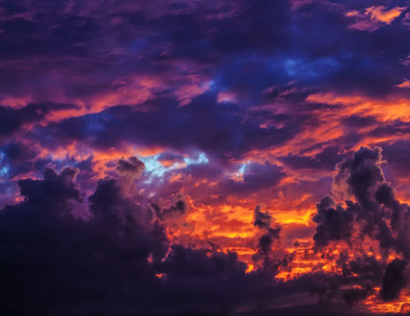 beautiful red bright clouds during sunset or sunrise, landscape in nature, out of focus