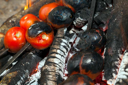 burning logs at the time of preparation of coals for cooking food, including meat for barbecue. close-upの写真素材
