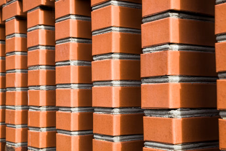 part of the wall of a building made of bricks, urban buildingの写真素材