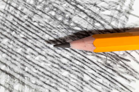 chaotic lines in gray pencil on ordinary paper of poor quality, closeup of homemade Amateur drawingの写真素材