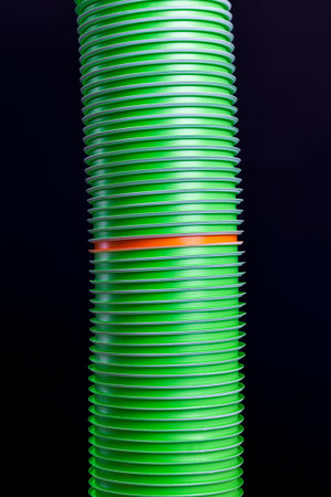 disposable plastic beverage cups, close up of plastic cookware, one orange plastic Cup
