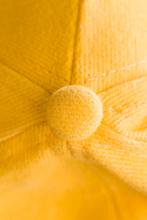 a piece of material made of synthetic material painted yellow, high-quality artificial fabric is...