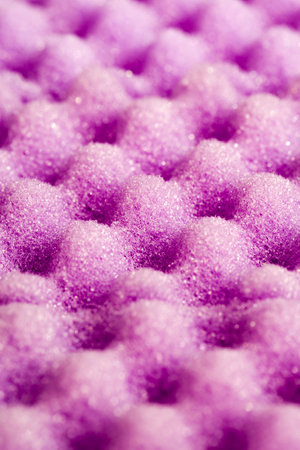 purple sponges for washing dishes and other items, closeup of kitchen spongesの写真素材