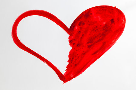 heart drawn shape with pencils of the same color on poor quality paper, close up of homemade drawingの写真素材