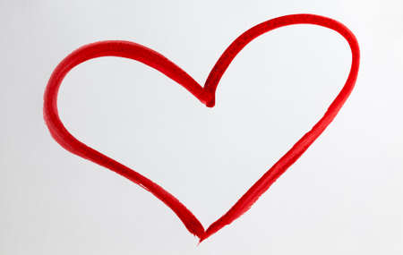 heart shape drawn with pencils of the same color on poor quality paper, closeup of homemade Amateur drawingの写真素材