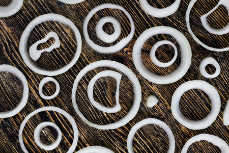 onion cut into rings on a cutting Board during cooking, kitchen table during cooking food