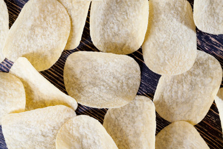 a large number of potato chips crispy and tasty, without the addition of and interspersed with spicesの写真素材