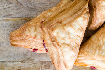 fresh buns with cherry jam, fresh homemade cakes with red berry jam made from cherry berriesの写真素材
