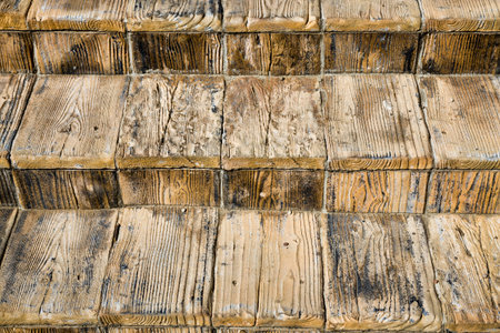 aged wooden boards of which the old staircase is made, details and close-up