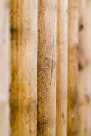 wooden fence photographed at a great angle and you can not see the space between the boards, abstract background, focus in the centerの写真素材