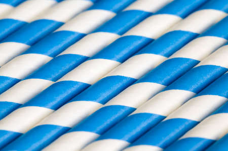 blue plastic tubes for drinking drinks and cocktails close-upの写真素材