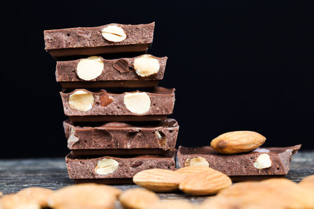 real almonds and chocolate from cocoa, the details of the chocolate broken into pieces