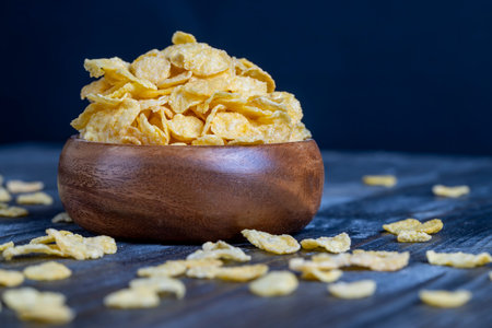dry breakfast corn flakes of yellow color, preparation of corn dry breakfast of flour in the form of...