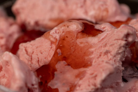 red ice cream with berry flavor and smell, natural ice cream with strawberry flavor and fresh...