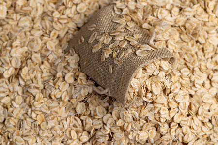 a linen bag with oatmeal flakes for porridge, close up