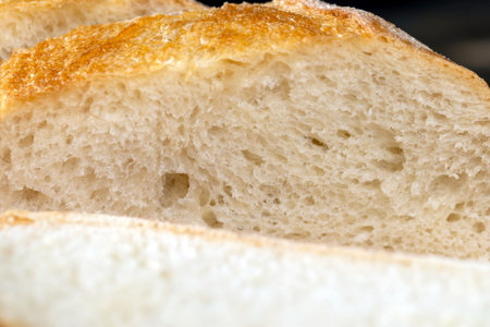 wheat loaf of bread close-up on the table, fresh homemade bread